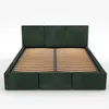 A green upholstered bed frame with a slatted base, shown from the front on a white background. Produktbild-Vorschau