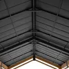 Close-up view of the underside of a dark gray metal roof structure with wooden beams visible at the bottom. Náhled obrázku produktu