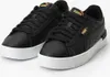 A pair of black Puma Jada Distressed sneakers with white soles and gold accents. Podgląd zdjęcia produktu