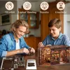 A mother and son are assembling a 3D puzzle of a coffee shop. Náhled obrázku produktu