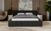 A bedroom scene with a bed as the main focus, styled with bedding and decor. Náhled obrázku produktu