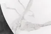 A close-up view of a white marble-patterned surface with gray veining, partially obscured by a dark gray edge. Produktbild-Vorschau