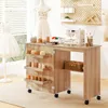 A sewing table with a sewing machine, spools of thread, and other crafting supplies. Produktbild-Vorschau