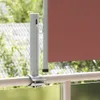 A close-up view of a retractable side awning attached to a balcony railing. Produktbild-Vorschau