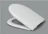 A white toilet seat and lid are shown against a plain gray background. Anteprima dell’immagine prodotto