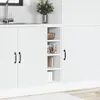 A white kitchen cabinet with a sink and a plant in the background. Produktbild-Vorschau