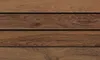A close-up view of wooden planks with a natural wood grain texture. Náhľad obrázku produktu