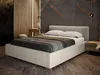 A modern bedroom with a bed, nightstand, and decorative wall. Produktbild-Vorschau
