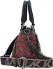 A side view of a handbag against a white background. Produktbild-Vorschau