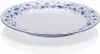 A white plate with a blue floral pattern around the rim, set against a white background with a shadow. Produktbild-Vorschau