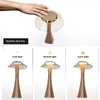 A collage showing a touch-dimmable LED table lamp with different light settings and a hand interacting with it. Produktbild-Vorschau