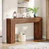 A wooden console table with decorative elements and a basket underneath, placed in a hallway or entryway. Anteprima dell’immagine prodotto