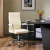An office chair is shown in an office setting with a desk and artwork on the wall. Produktbild-Vorschau