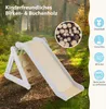 A wooden children's slide and climbing structure set up outdoors in a natural, wooded environment. Anteprima dell’immagine prodotto