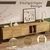A modern TV stand with a natural wood finish and curved front panels, displayed in a living room setting with artwork and decorative items. Voir les images du produit