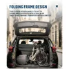 A folded electric bicycle is placed in the trunk of a car. Produktbild-Vorschau