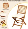 A wooden folding chair with a beige cushion, shown with callouts highlighting its features. Náhľad obrázku produktu