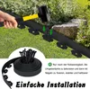 A hand is using a mallet to hammer a stake into the ground to secure a black plastic garden edging. Náhled obrázku produktu