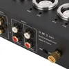 A close-up view of the rear panel of an audio amplifier, showing various input and output connectors, along with regulatory markings and website information. Podgląd zdjęcia produktu