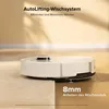 A white robot vacuum cleaner is shown on a wooden floor, transitioning to a lighter colored surface. Text overlays highlight a feature of the device. Produktbild-Vorschau