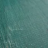 A close-up, angled view of a teal-colored tarp or cover with a textured weave pattern. Produktbild-Vorschau
