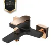 A black and gold bathtub faucet against a white background. Produktbild-Vorschau