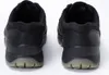 A pair of black Ecco Track 25 men's shoes shown from the back. Produktbild-Vorschau