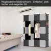 A modular wardrobe system is shown in a bedroom setting next to a sofa and a nightstand, with clothes hanging inside. Produktbild-Vorschau