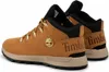 A pair of brown Timberland Sprint Trekker Mid hiking boots with gold accents and laces, shown from a side-rear angle on a white background. Produktbild-Vorschau