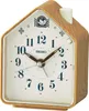 A close-up studio shot of a SEIKO alarm clock with a wood-grain finish. Anteprima dell’immagine prodotto