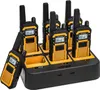 A set of six walkie-talkies in a charging dock. Anteprima dell’immagine prodotto