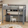 A loft bed with a desk and shelves underneath, set up in a room. Voir les images du produit