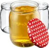 Three glass jars, one filled with a yellow liquid, and a red lid with white hearts are arranged on a white background. Anteprima dell’immagine prodotto