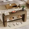 A living room scene with a console table, sofa, coffee table, and stools. Podgląd zdjęcia produktu