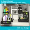 An under-sink organizer with cleaning supplies and paper towels stored inside. Produktbild-Vorschau
