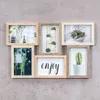 A collage of six picture frames with various plant-themed images and one frame with the word 'enjoy' on a gray textured background. Produktbild-Vorschau