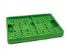 A green folding box is shown from a diagonal angle against a white background. Produktbild-Vorschau