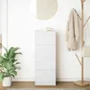 A white chest of drawers is shown in a room with a plant and a coat rack. Anteprima dell’immagine prodotto