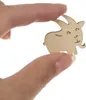A person's fingers are holding a small wooden goat puzzle. Náhled obrázku produktu