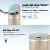 A split image showing a beige automatic trash can with its lid open and a hand approaching it, and a close-up of the lid with a finger pressing a button. Produktbild-Vorschau