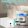 Diagram showing a robot vacuum cleaner docking station with a water tank and a dust bag. Produktbild-Vorschau
