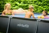 A family enjoying a swim in an above-ground pool on a sunny day. Produktbild-Vorschau