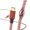 A close-up of a USB-C charging cable with a USB-A connector visible in the background. Produktbild-Vorschau