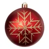A single red Christmas ornament with a gold glitter snowflake design. Produktbild-Vorschau