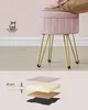 A pink velvet stool with gold legs, shown from the side, with a graphic illustration below detailing its layered construction. Náhled obrázku produktu