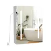 A bathroom scene reflected in a lighted mirror, showing a bathtub and plants. Produktbild-Vorschau