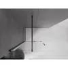 A modern bathroom with a bathtub and a glass shower enclosure. Podgląd zdjęcia produktu