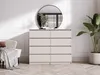 A bedroom or living room setting with a dresser, chair, mirror, and plant. Náhled obrázku produktu