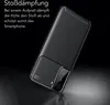 A black carbon fiber textured phone case is shown at an angle against a black background, with German text describing its shock absorption features. Produktbild-Vorschau