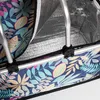 Close-up view of the interior and exterior of a foldable picnic basket with a floral pattern. Náhled obrázku produktu